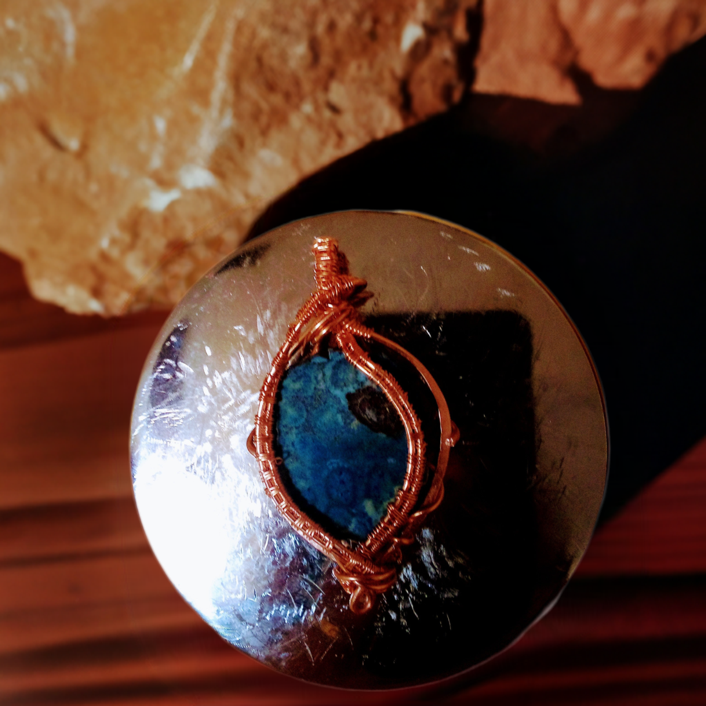Gemstone handcrafted with copper wrap