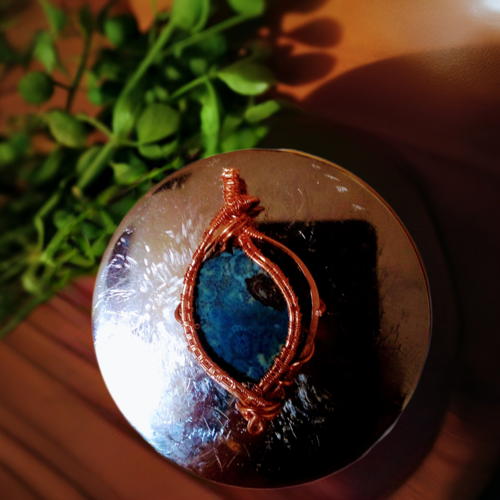 Gemstone handcrafted with copper wrap